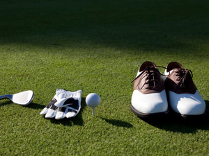 golf accessories grouped on the course